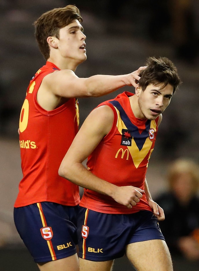 AFL 2016 U18 Championship - SA v Vic C MELBOURNE, AUSTRALIA - JUNE 24: Lewis Young of South Australia (left) congratulates Ben Jarman of South Australia on a goal during the Under 18 Championship match between South Australia and Vic Country at Etihad Stadium on June 24, 2016 in Melbourne, Australia. (Photo by Adam Trafford/AFL Media)